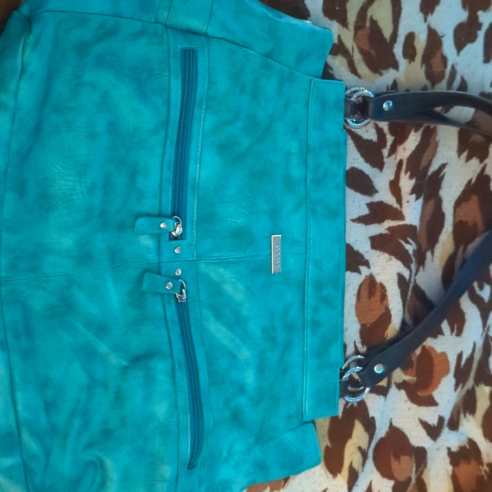 Miche with turquoise shell, women's February 2011.